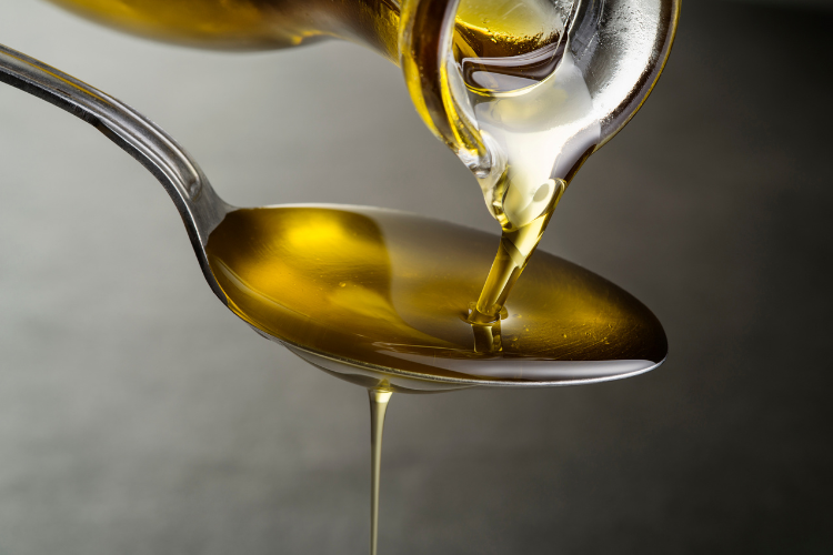 Spoon of cooking oil